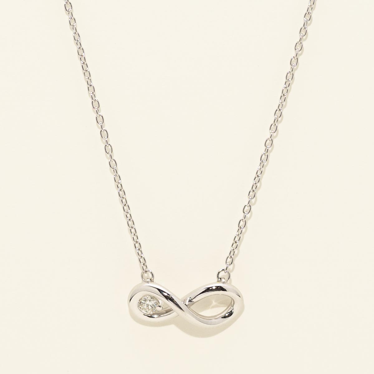 Northern Star Diamond Love Knot Infinity Necklace in Sterling Silver (1/10ct)