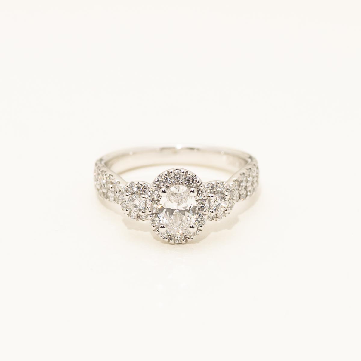 Oval Diamond Halo Engagement Ring in 14kt White Gold ( 1/13ct tw)