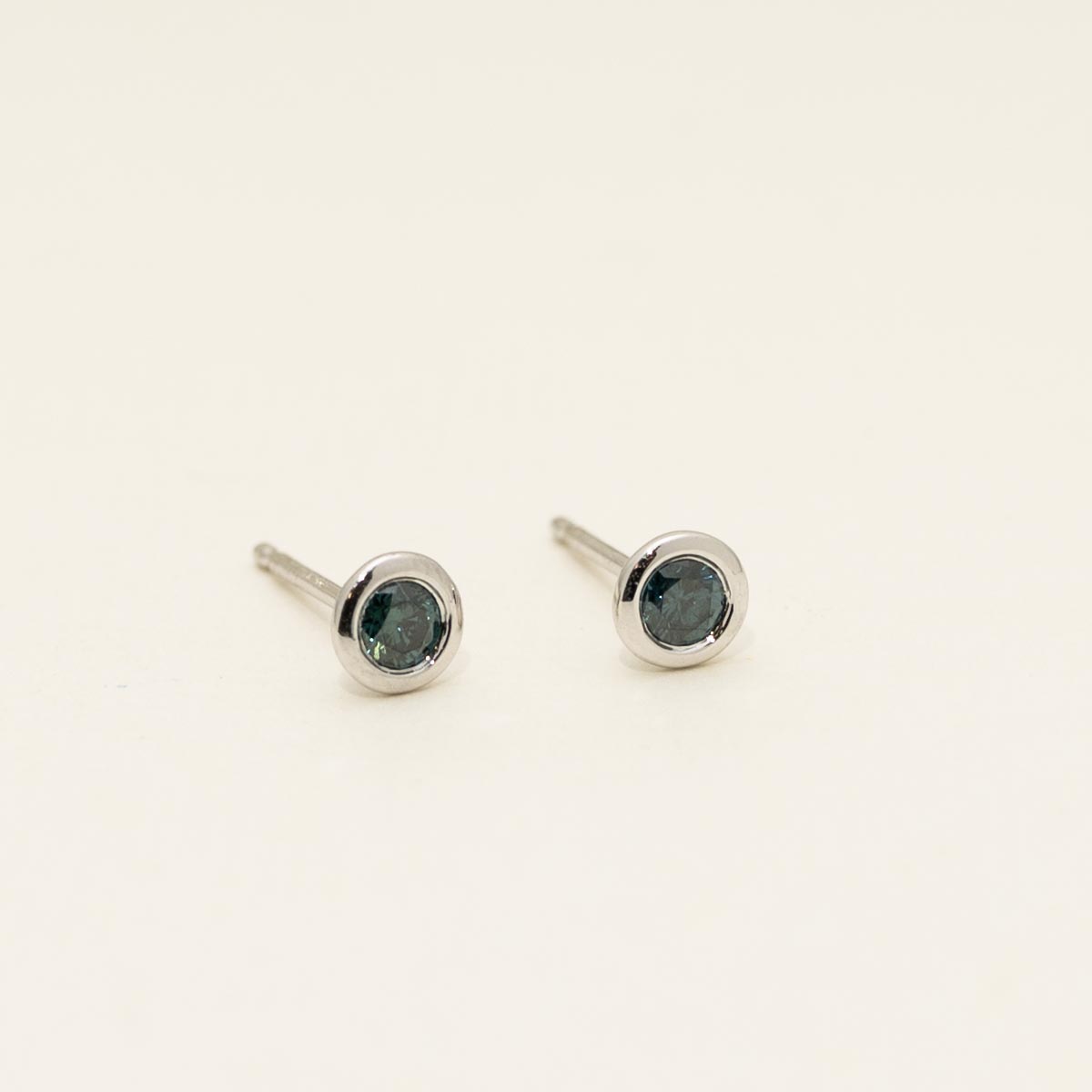 Blue Diamond Bezel Set Stud Earrings in 14kt White Gold (1/5ct tw)
