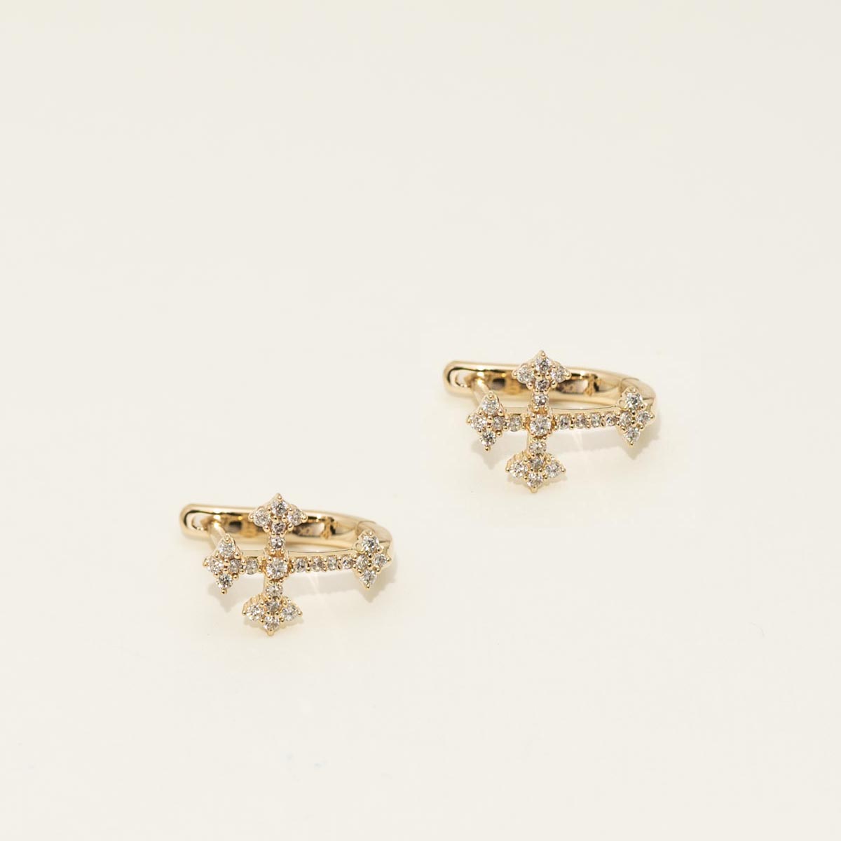 Diamond Cross Huggie Hoop Earrings in 10kt Yellow Gold (1/4ct tw)