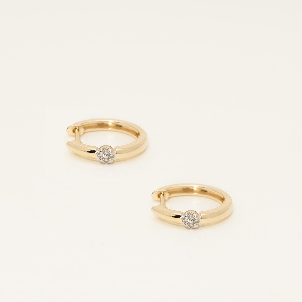 Diamond Huggie Hoop Earrings in 10kt Yellow Gold (1/10ct tw)