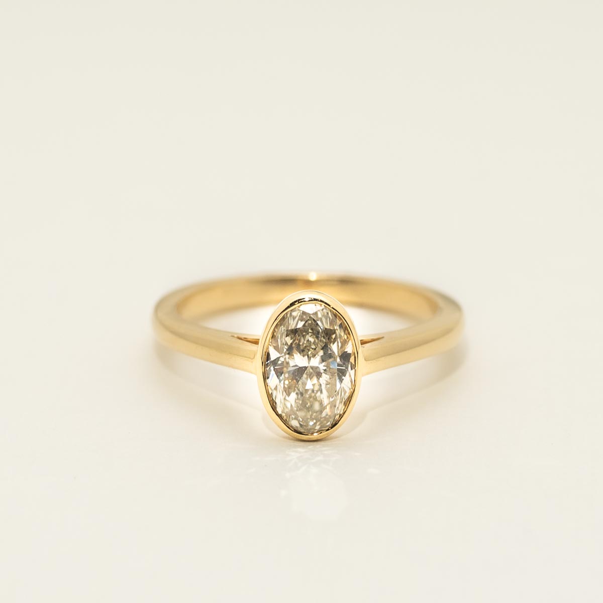 Oval Diamond Bezel Engagement Ring in 18kt Yellow Gold (1 1/5ct)