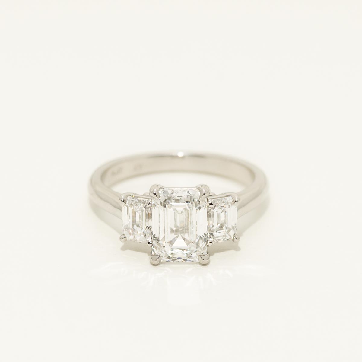 Emerald Cut Diamond Three Stone Engagement Ring in Platinum (3ct tw)