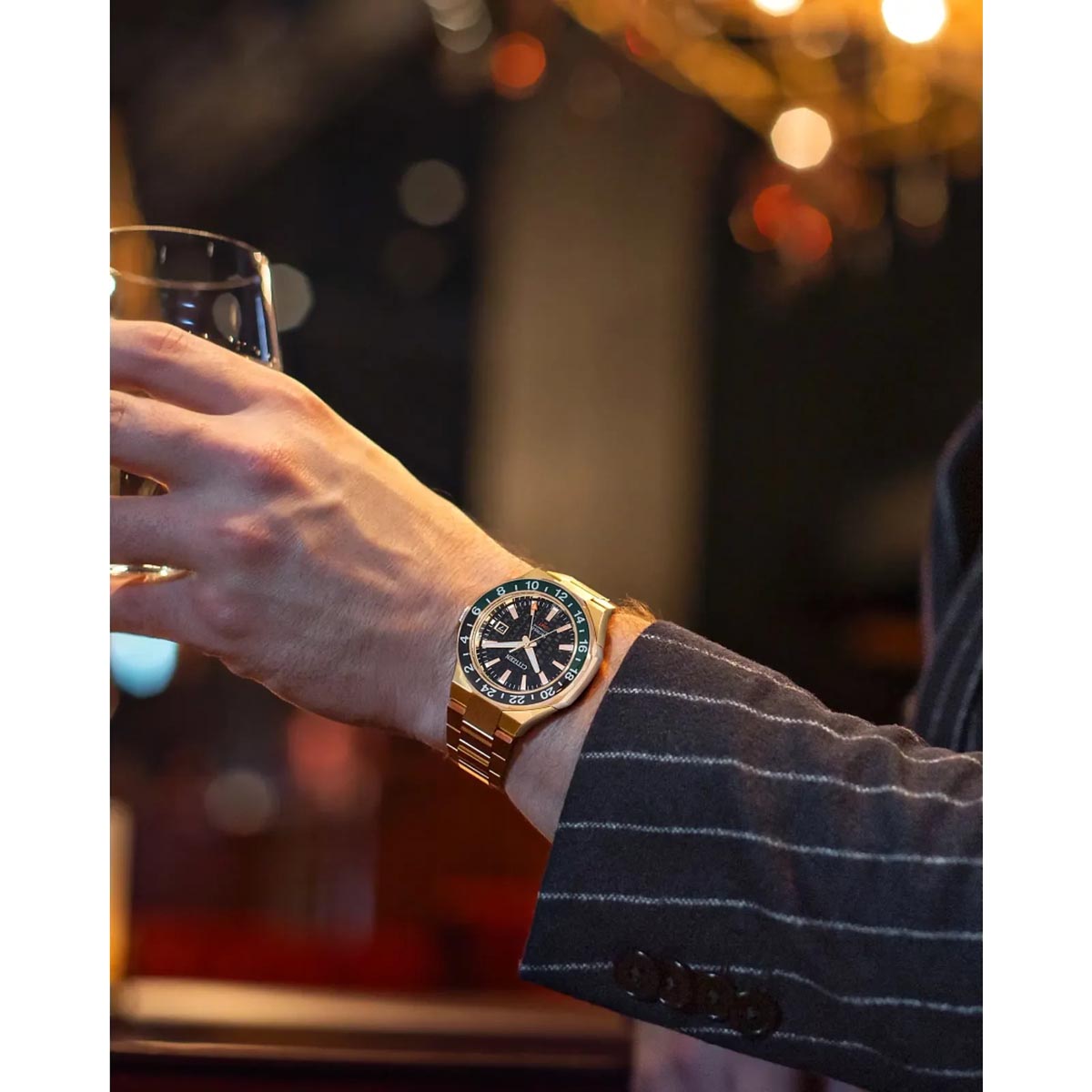 Citizen Series8 880 GMT Mens Watch with Black Dial and Gold Toned Stainless Steel Bracelet (automatic movement)