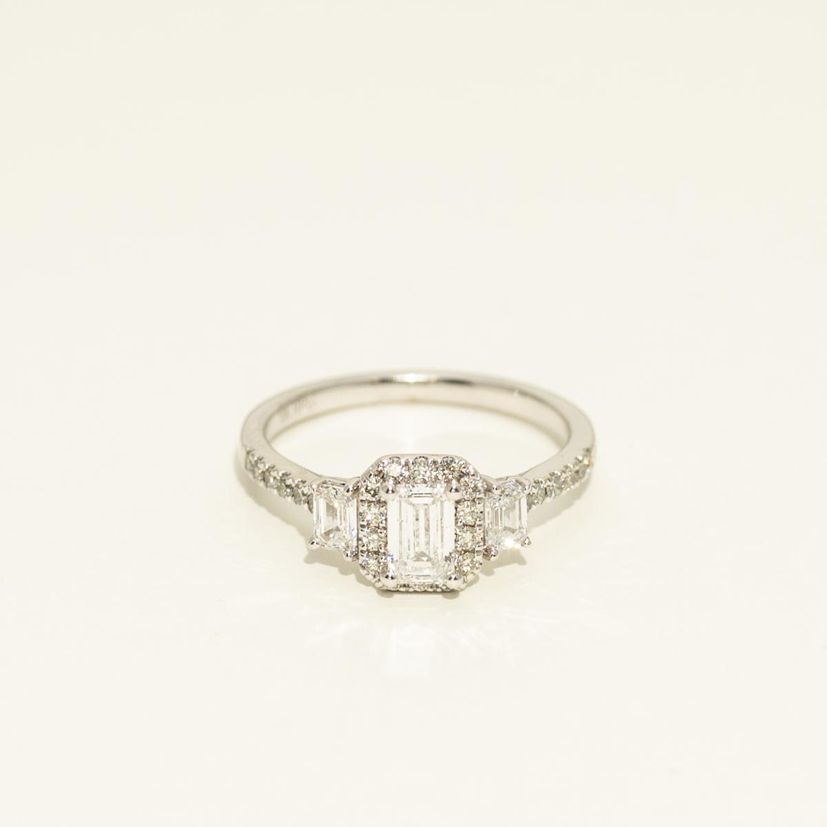 Emerald Cut Diamond Three Stone Halo Engagement Ring in 18kt White Gold (1ct tw)