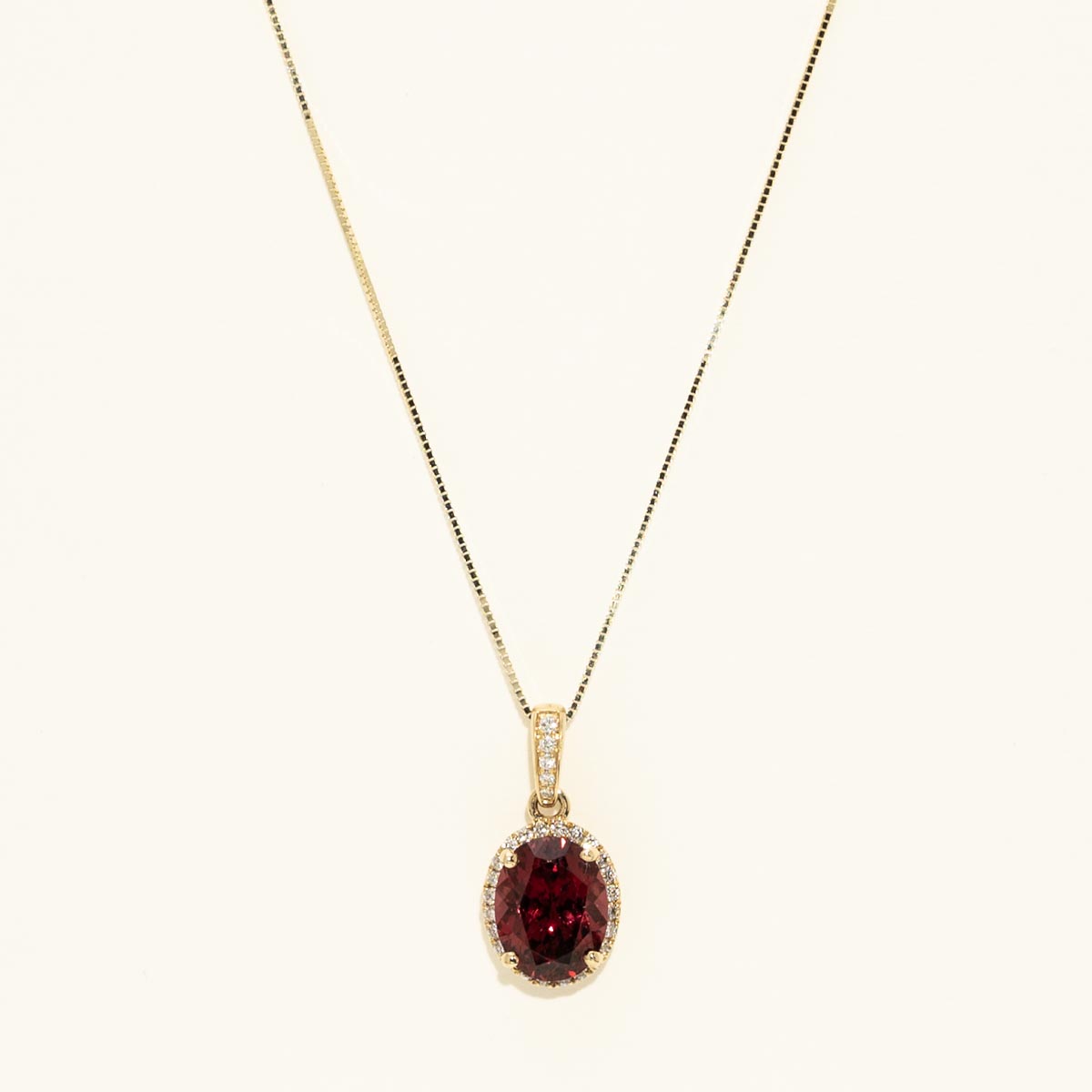 Oval Rhodolite Garnet Necklace in 14kt Yellow Gold with Diamonds (1/7ct tw)