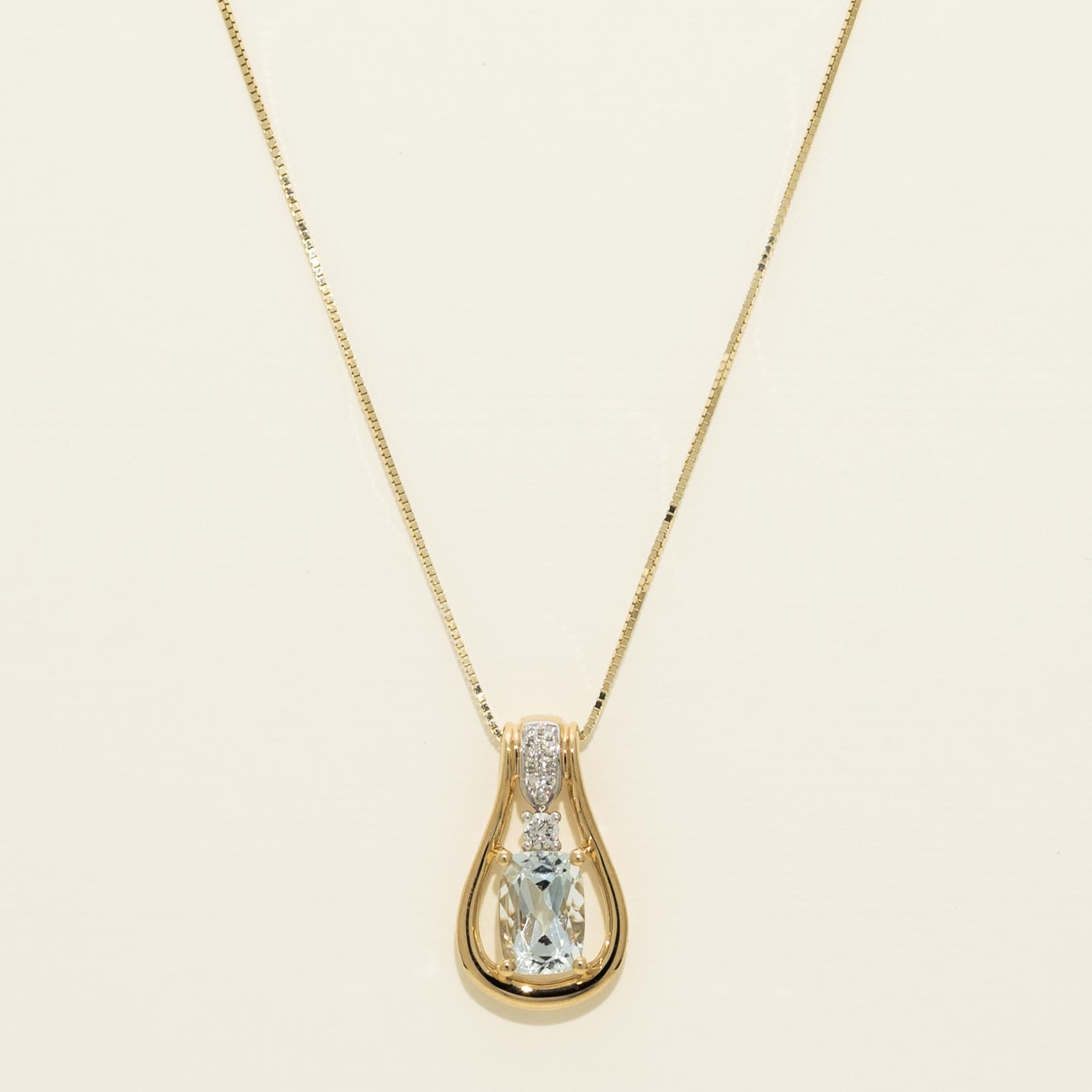 Cushion Cut Aquamarine Necklace in 14kt Yellow Gold with Diamonds (1/20ct tw)