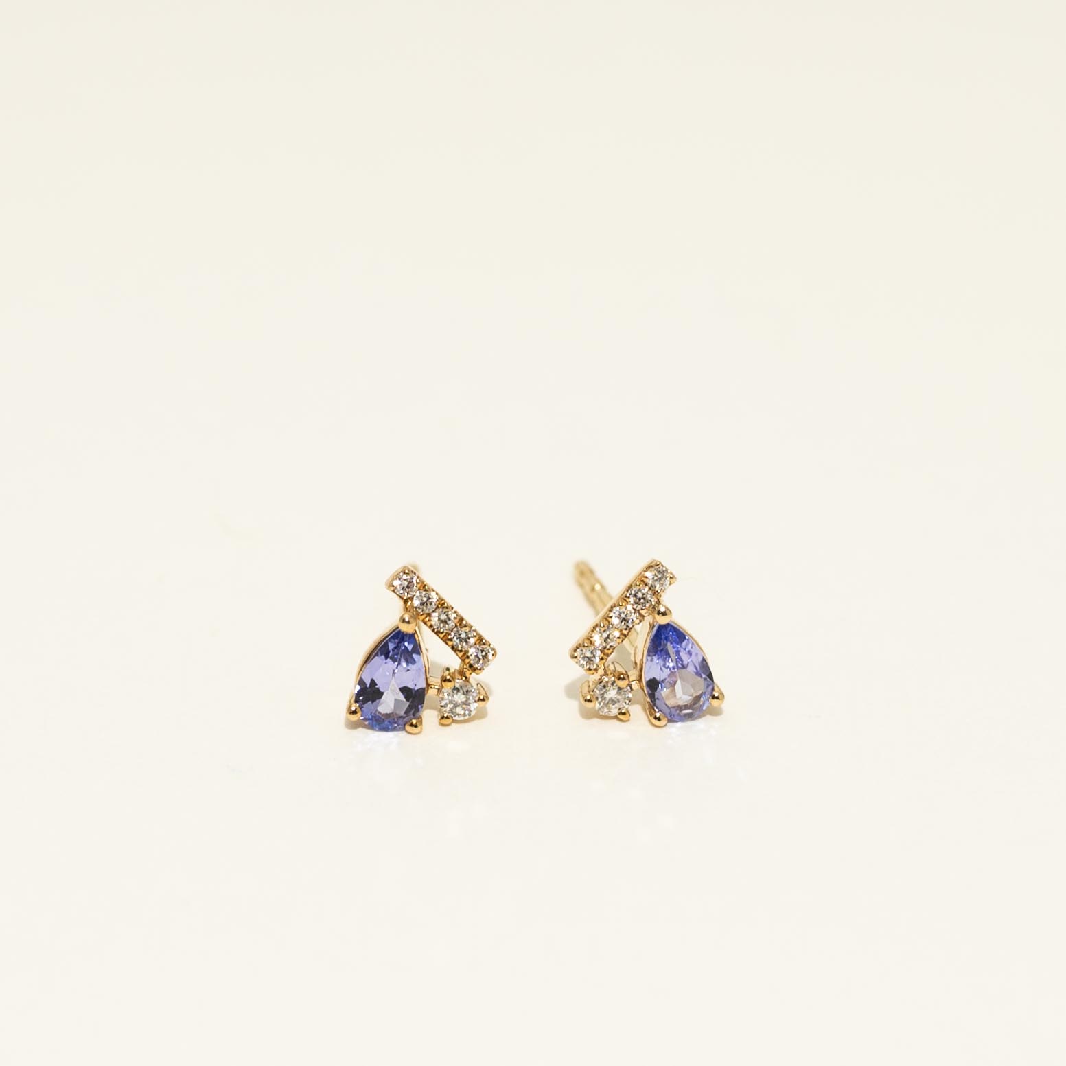 Pear Shape Tanzanite Stud Earrings in 14kt Yellow Gold with Diamonds (1/10ct tw)