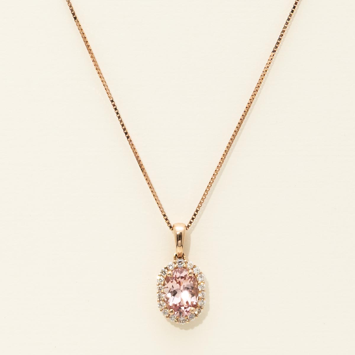 Parlé Oval Lotus Garnet Halo Necklace in 14kt Rose Gold with Diamonds (1/7ct tw)