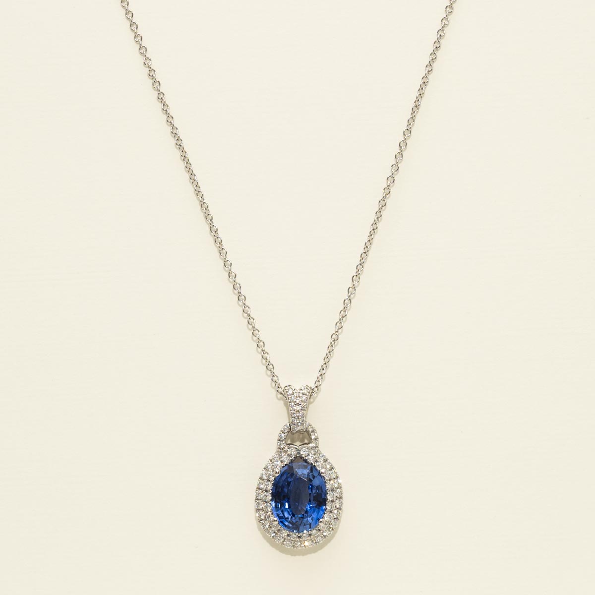 Oval Sapphire Necklace in 18kt White Gold with Diamonds (1/2ct tw)