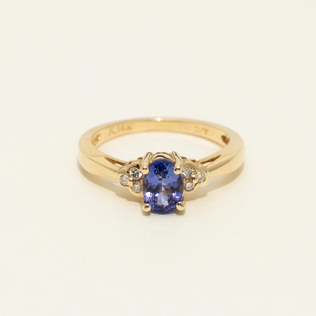 Oval Tanzanite Ring in 14kt Yellow Gold with Diamonds (1/10ct tw)