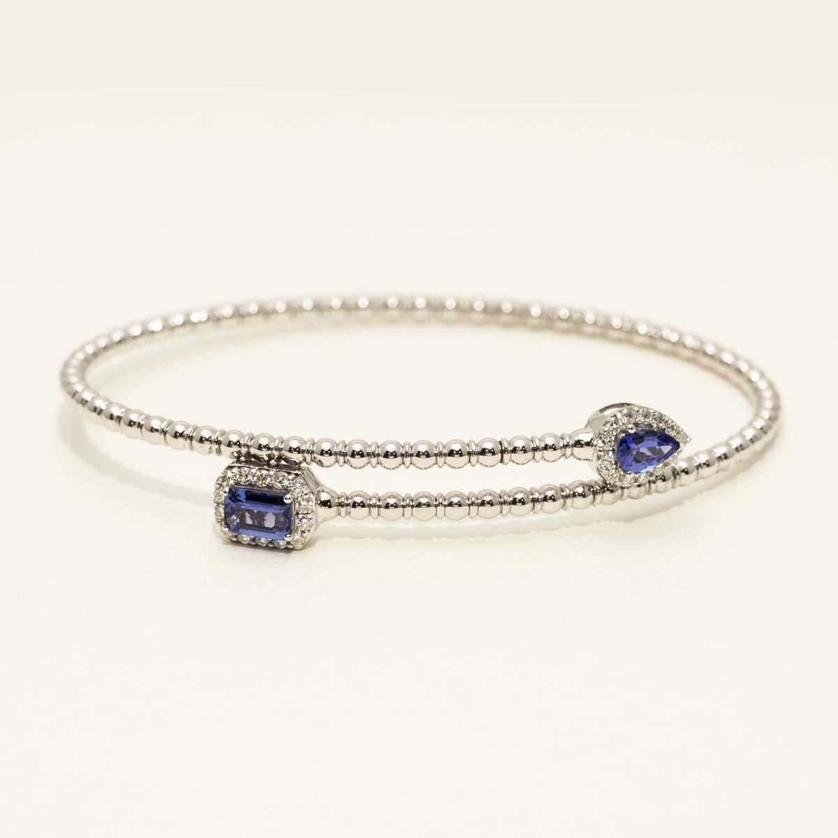 Emerald Cut and Pear Shape Tanzanite Flexible Bangle Bracelet in 14kt White Gold with Diamonds (1 3/8ct tw)
