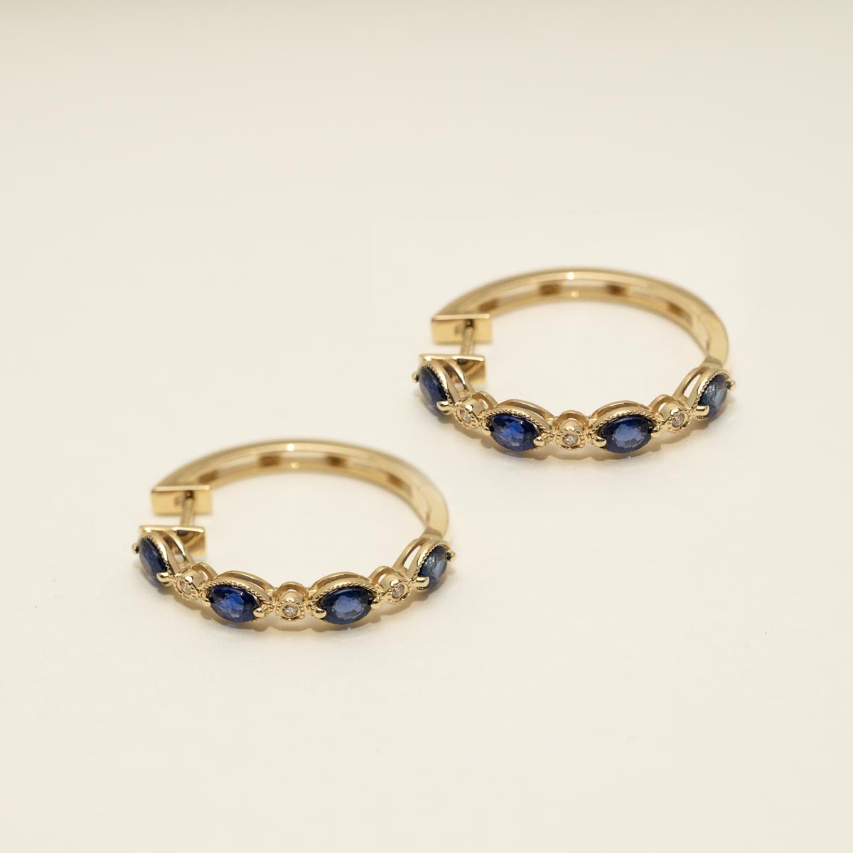 Dabakarov Oval Sapphire Hoop Earrings in 14kt Yellow Gold with Diamonds (1/20ct tw)