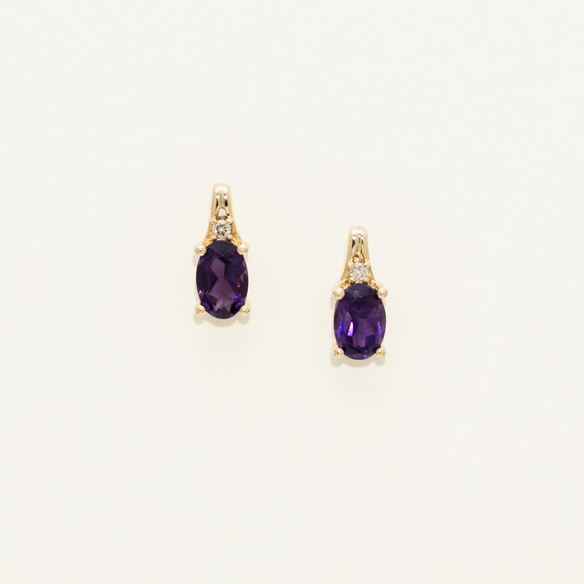 Oval Amethyst Earrings in 10kt Yellow Gold with Diamond (.02ct tw)