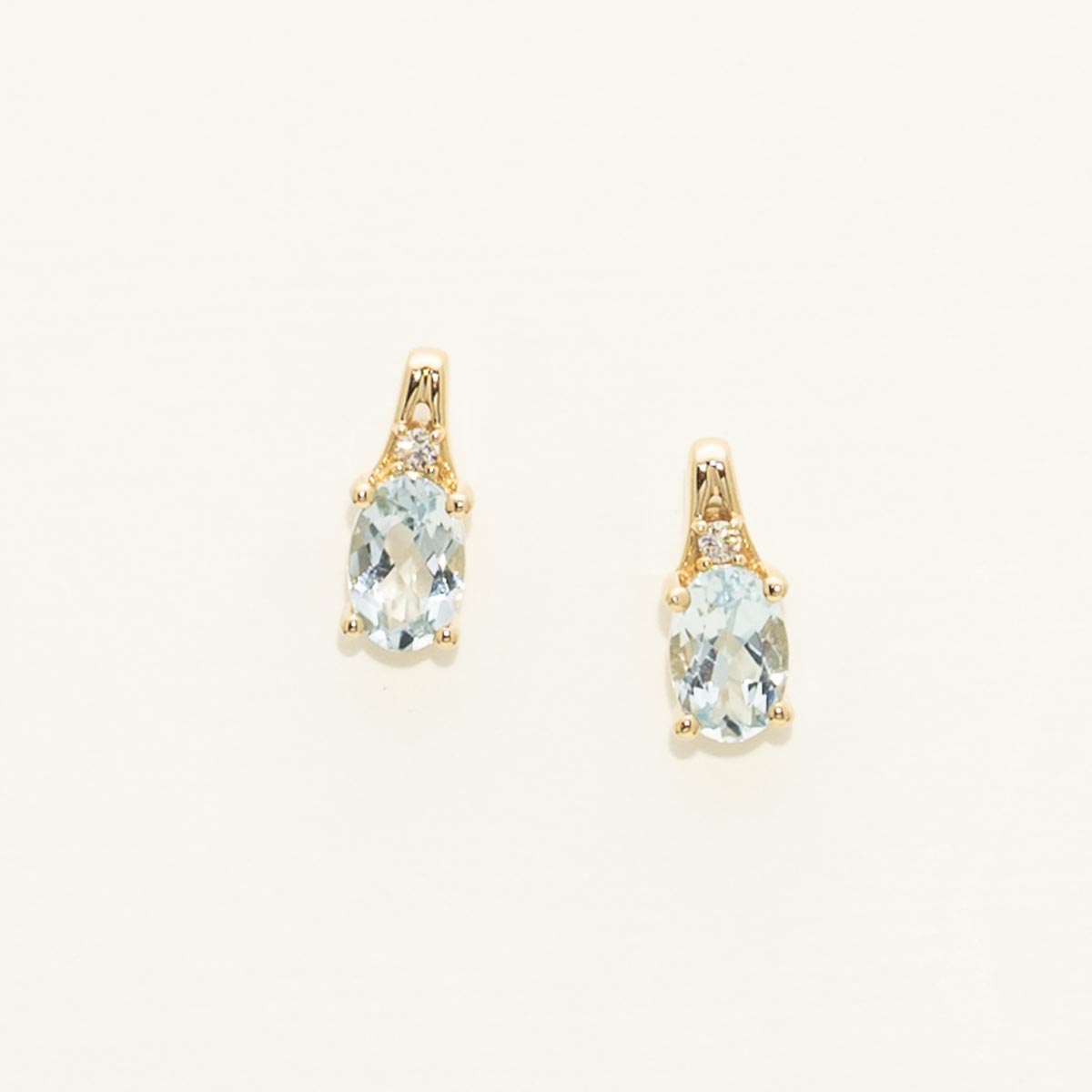Oval Aquamarine Earrings in 10kt Yellow Gold with Diamonds (.02ct tw)