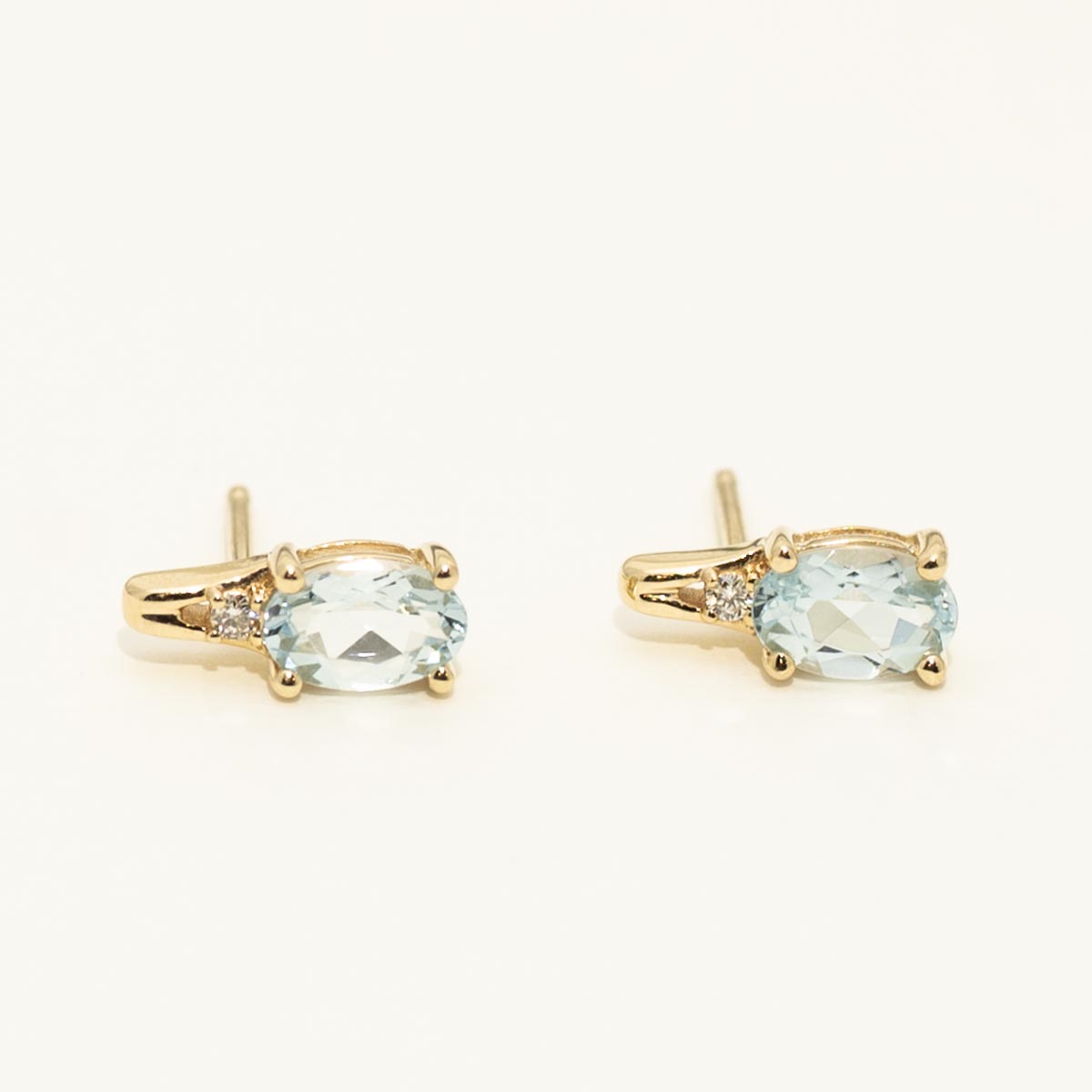 Oval Aquamarine Earrings in 10kt Yellow Gold with Diamonds (.02ct tw)