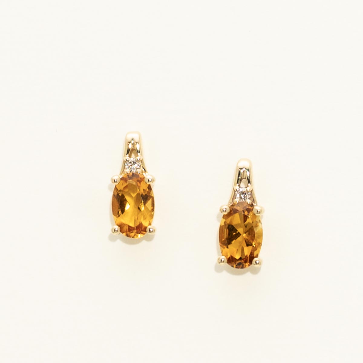 Oval Citrine Earrings in 10kt Yellow Gold with Diamonds (.02ct tw)