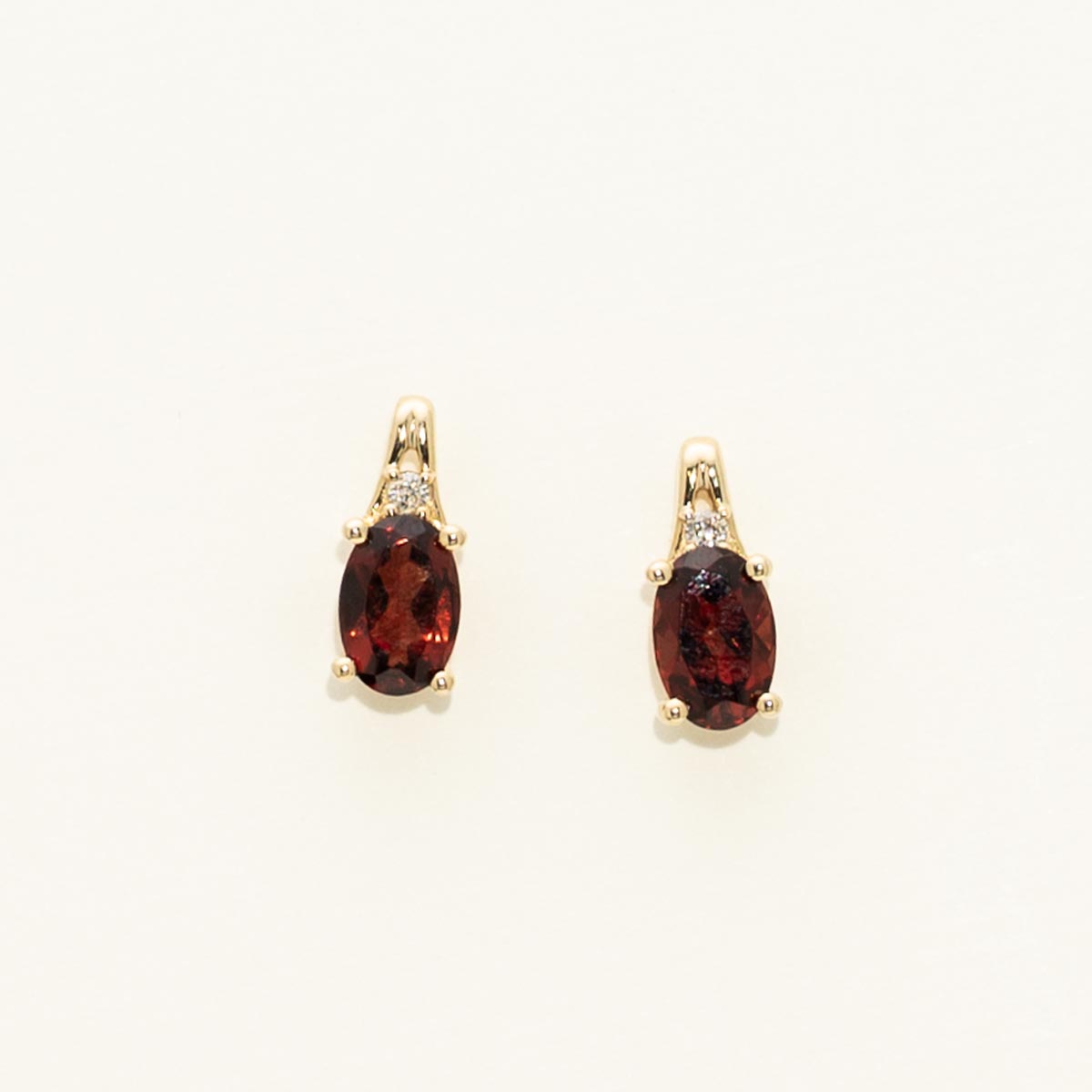 Oval Garnet Earrings in 10kt Yellow Gold with Diamonds (.02ct tw)