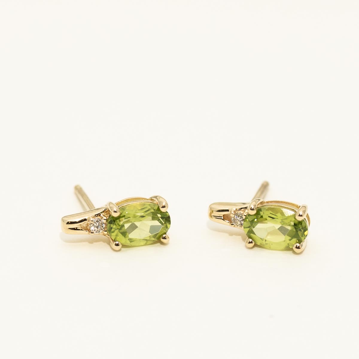 Oval Peridot Earrings in 10kt Yellow Gold with Diamonds (.02ct tw)
