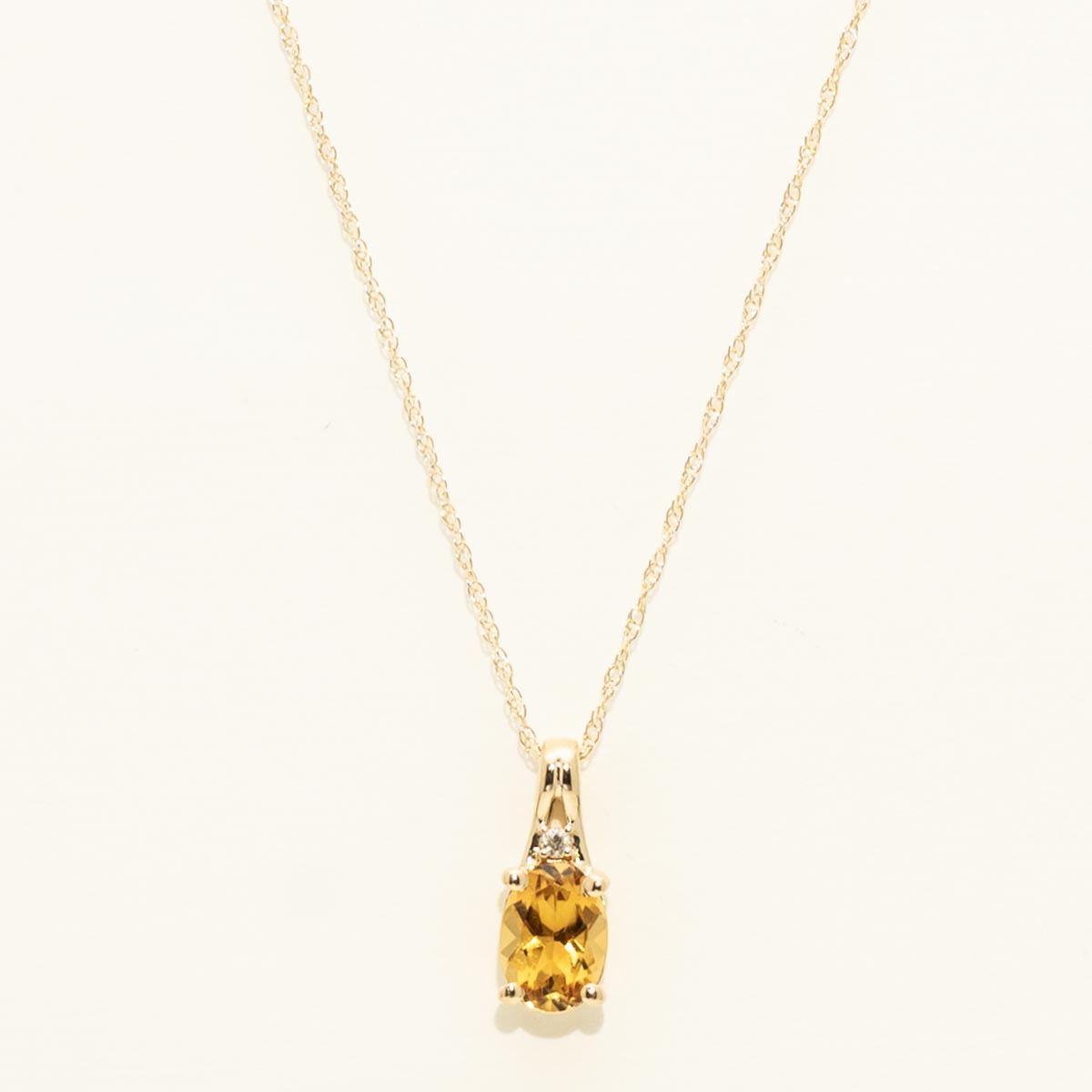 Oval Citrine Necklace in 10kt Yellow Gold with Diamond (.01ct)