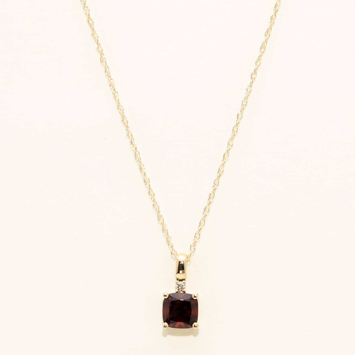 Cushion Cut Garnet Necklace in 10kt Yellow Gold with Diamond (.01ct)