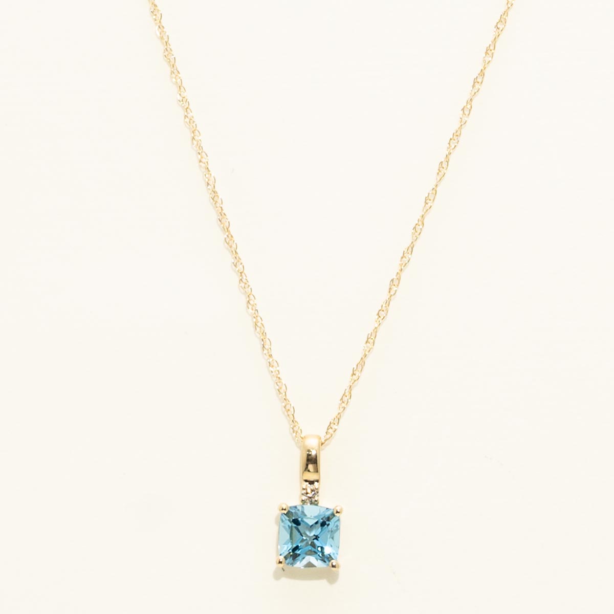 Cushion Cut Swiss Blue Topaz Necklace in 10kt Yellow Gold with Diamond (.01ct)