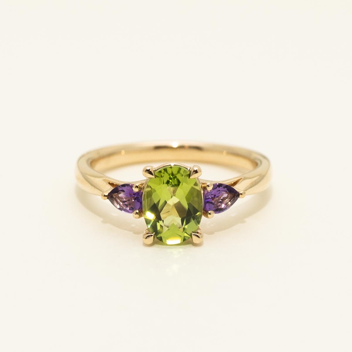 Oval Peridot and Pear Shaped Amethyst Ring in 14kt Yellow Gold