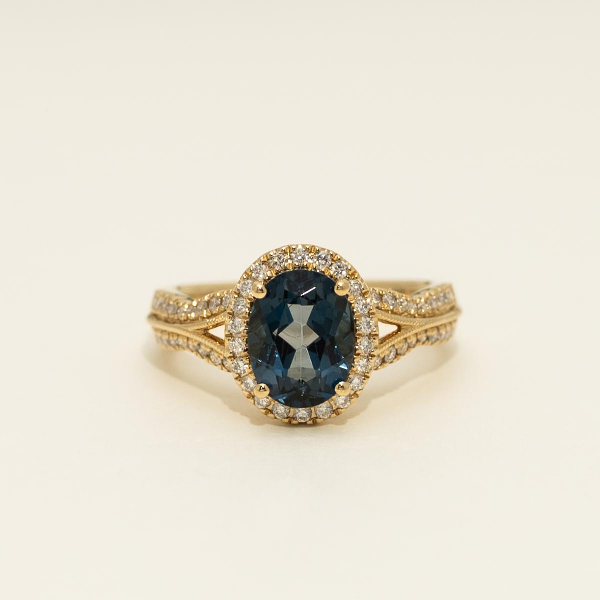 Oval London Blue Topaz Ring in 14kt Yellow Gold with Diamonds (1/3ct tw)