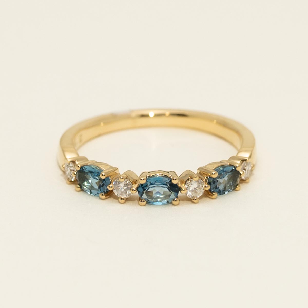 Oval London Blue Topaz Ring in 14kt Yellow Gold with Diamonds (1/7ct tw)