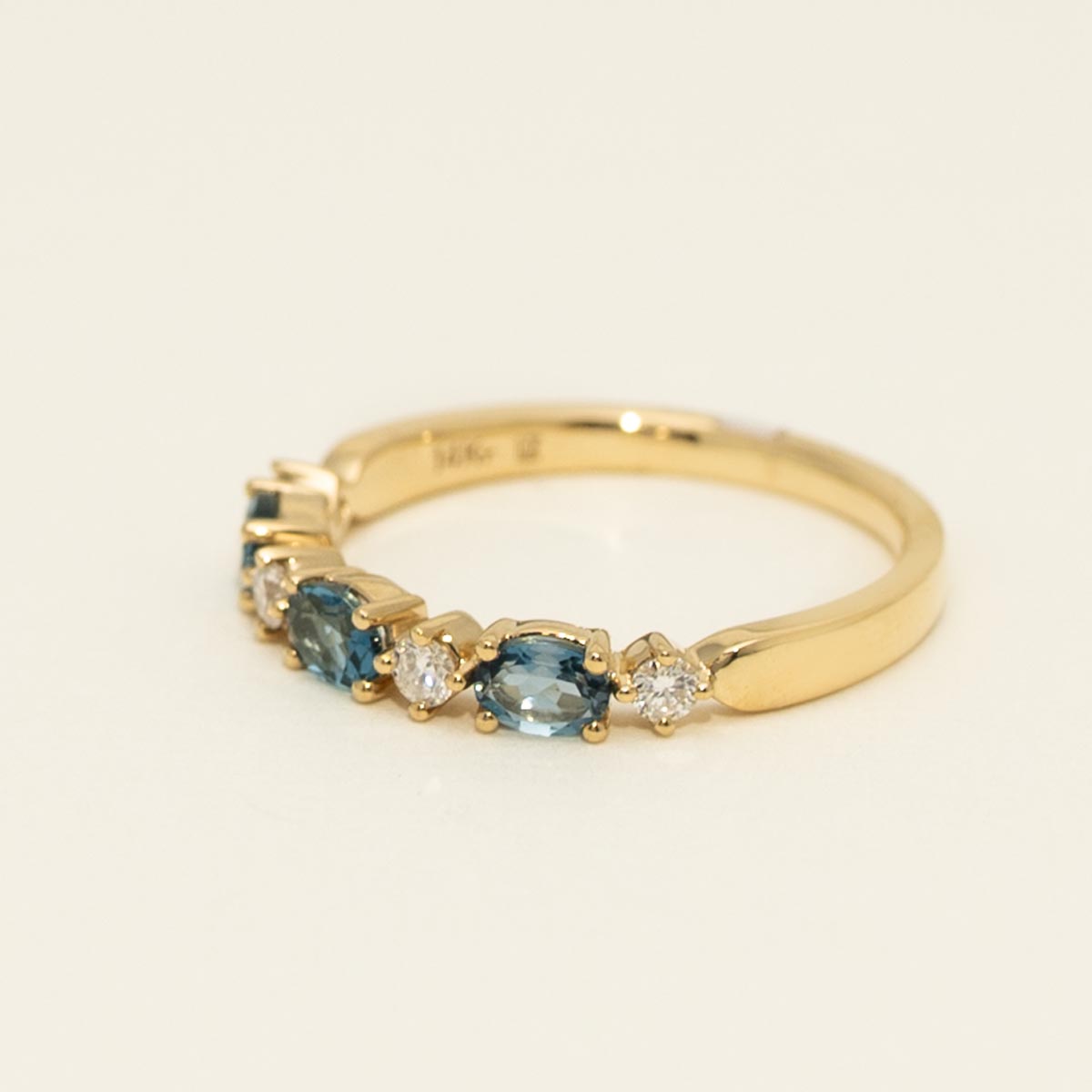 Oval London Blue Topaz Ring in 14kt Yellow Gold with Diamonds (1/7ct tw)