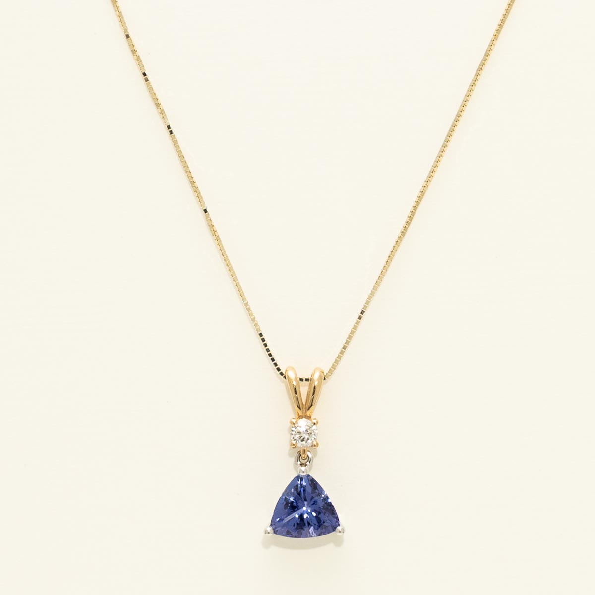 Trillion Cut Tanzanite Necklace in 14kt Yellow and White Gold with Diamond (1/10ct tw)