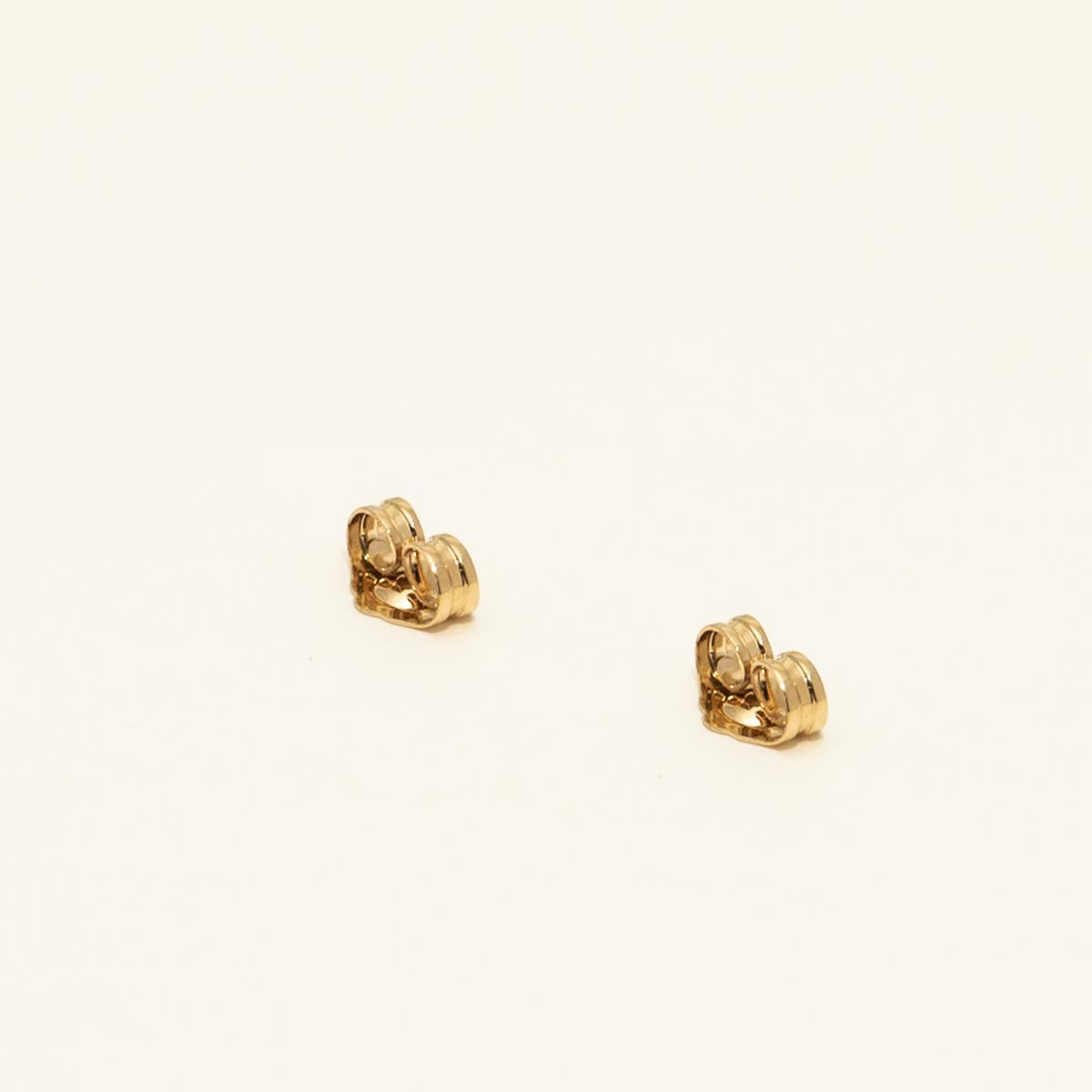 Trillion Cut Tanzanite Stud Earrings in 14kt Yellow Gold with Diamonds (1/10ct tw)