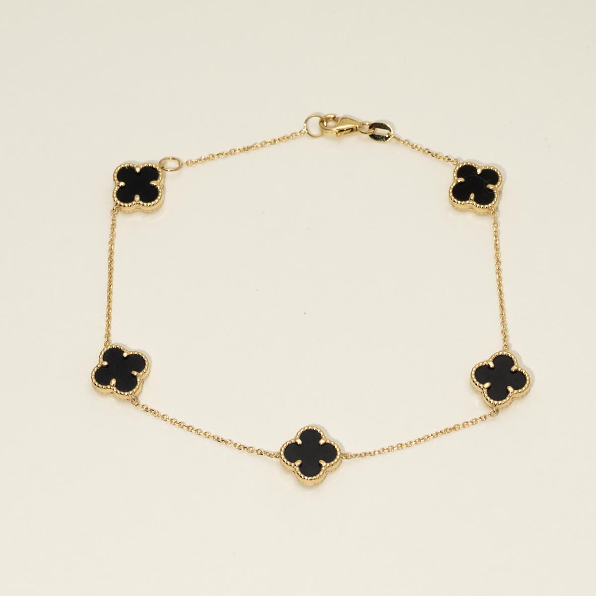 Black Onyx Clover Bracelet in 14kt Yellow Gold