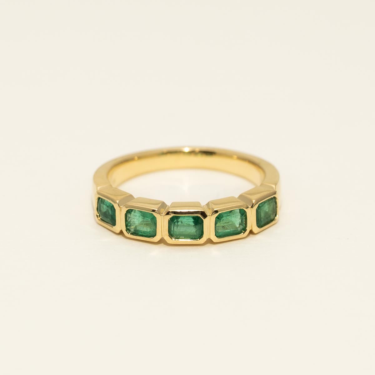 Emerald Cut Emerald Bezel Ring in 18kt Yellow Gold