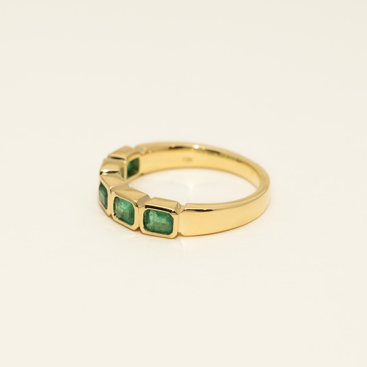 Emerald Cut Emerald Bezel Ring in 18kt Yellow Gold
