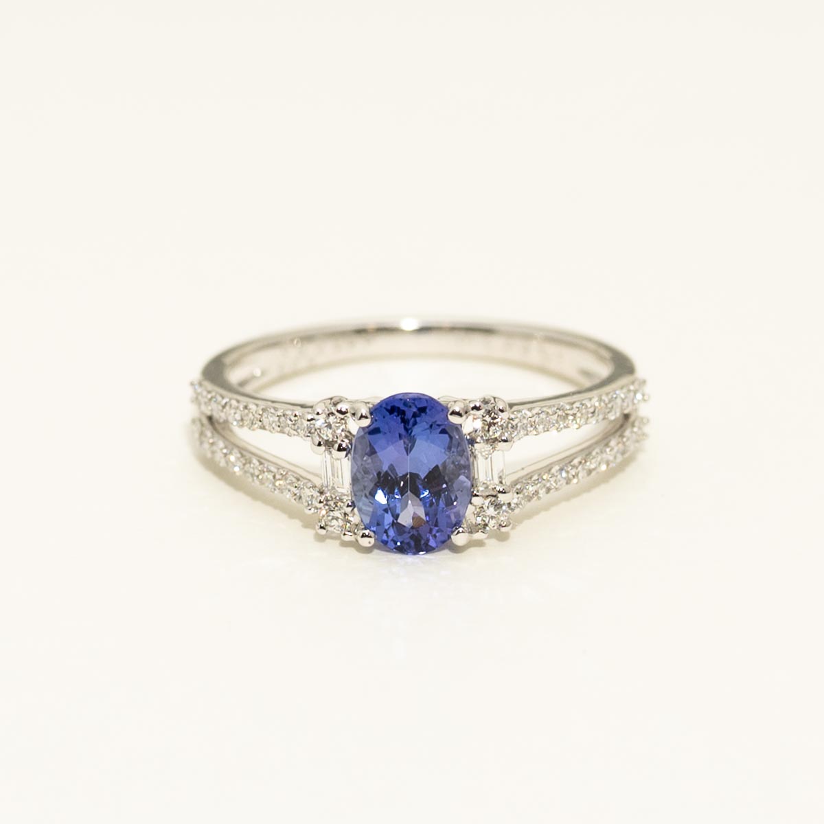 Oval Tanzanite and Diamond Ring in 14kt White Gold (1/3ct tw)