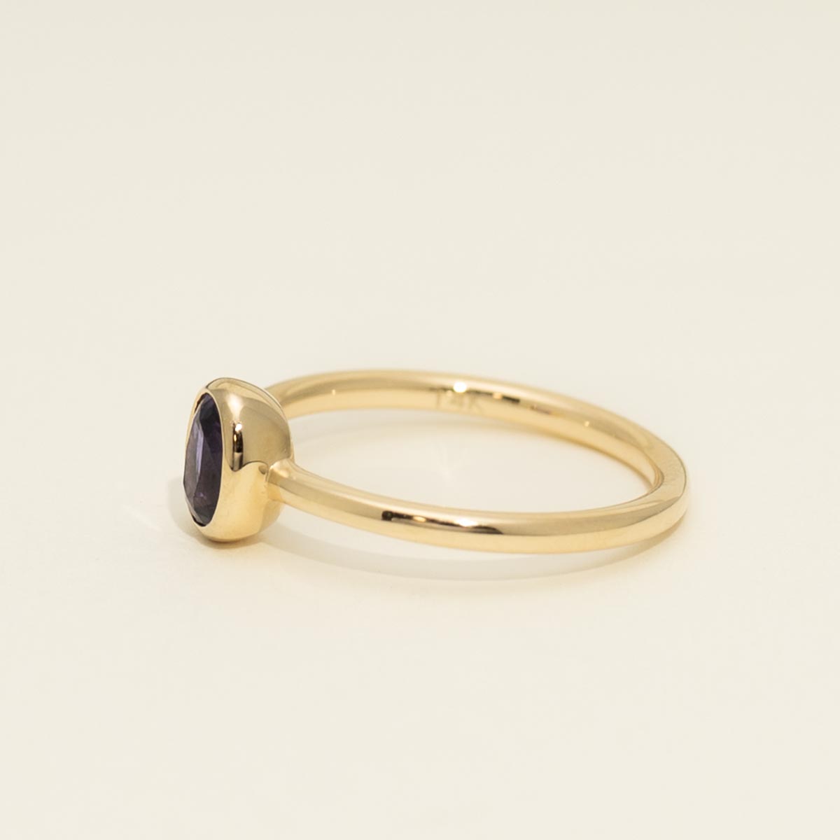 Oval Purple Sapphire Bezel Ring in 14kt Yellow Gold