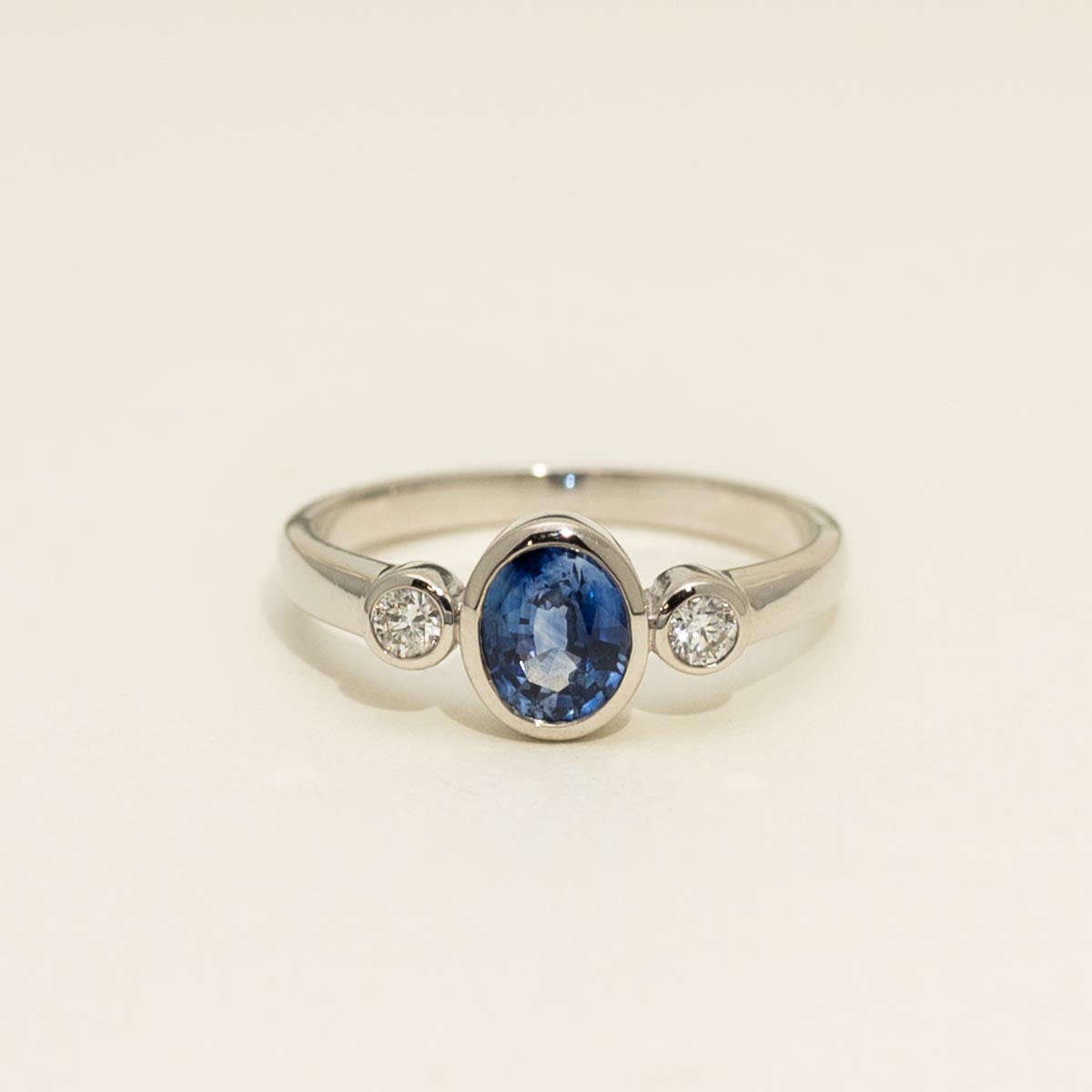 Oval Ceylon Sapphire Bezel Ring in 14kt White Gold with Diamonds (1/10ct tw)