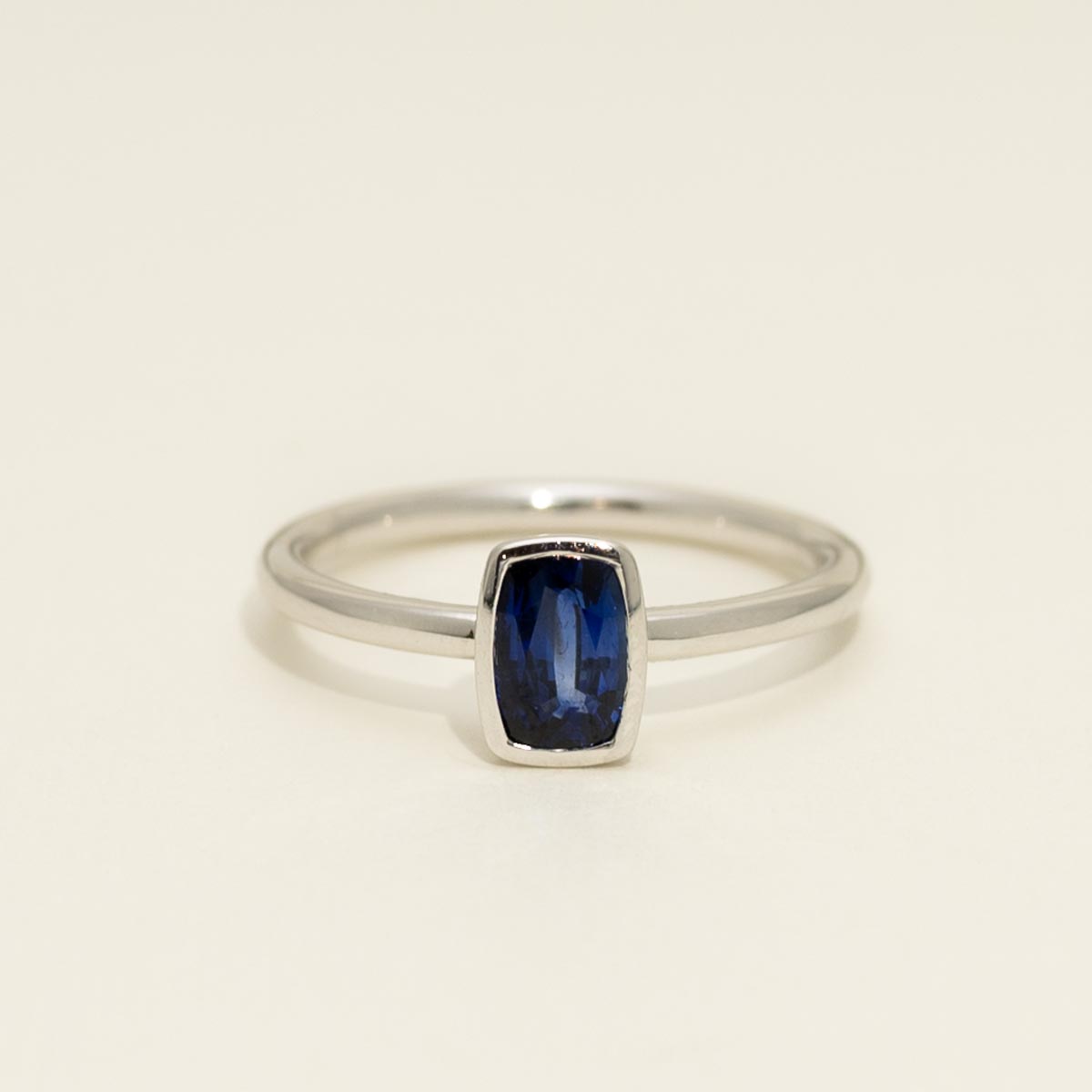 Cushion Cut Ceylon Sapphire Bezel Ring in 14kt White Gold