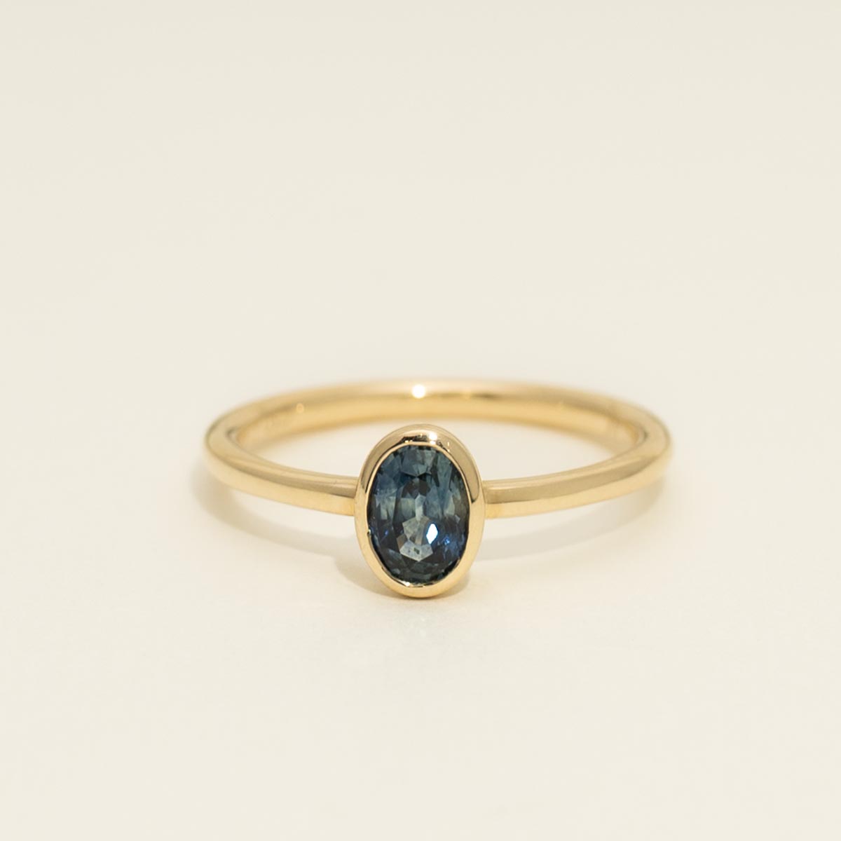 Oval Montana Sapphire Bezel Ring in 14kt Yellow Gold