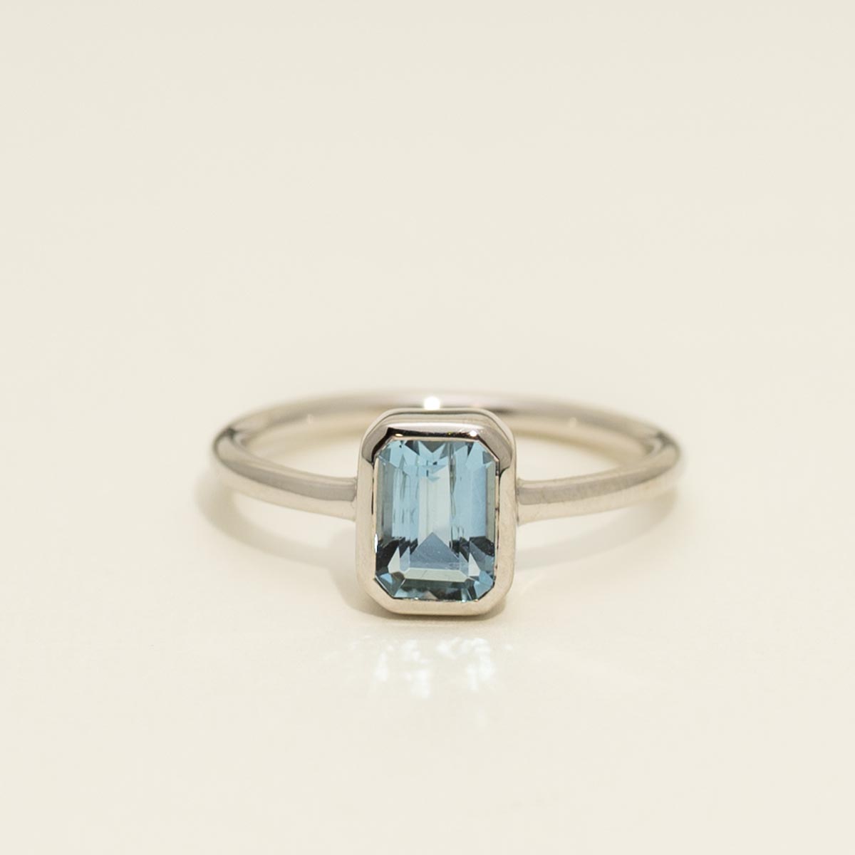 Emerald Cut Aquamarine Bezel Ring in 14kt White Gold