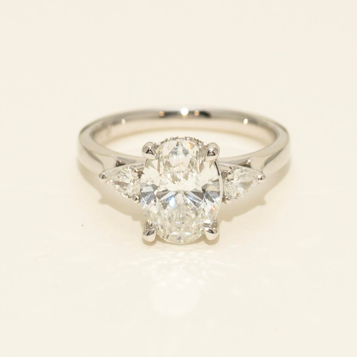 Oval and Pear Three Stone Diamond Engagement Ring in Platinum (2 1/4ct tw)