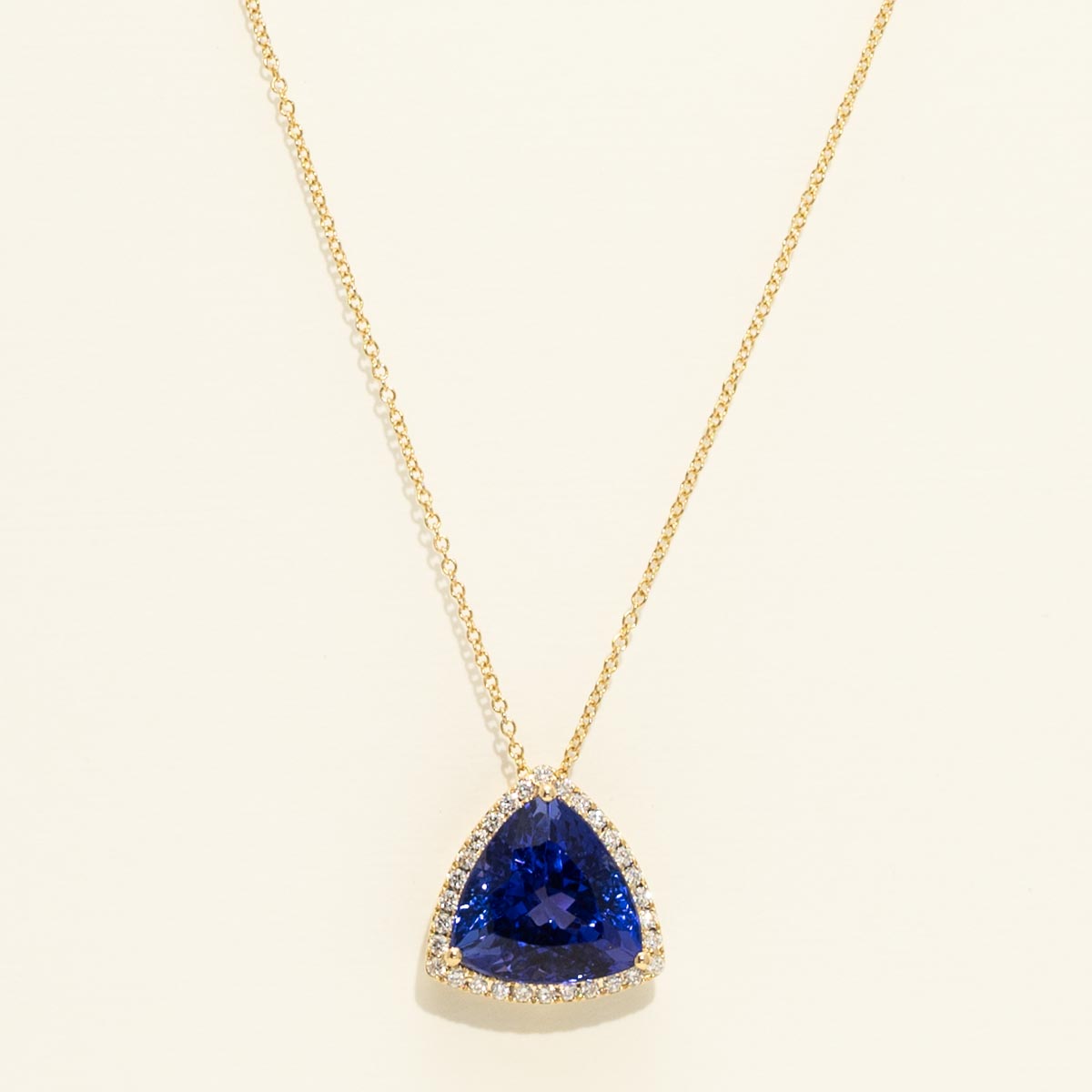 Trillion Cut Tanzanite Necklace in 18kt Yellow Gold with Diamonds (1/5ct tw)