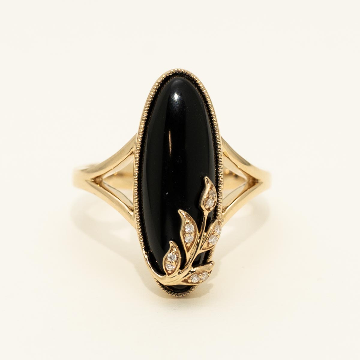 Oval Onyx Ring in 14kt Yellow Gold with Diamonds