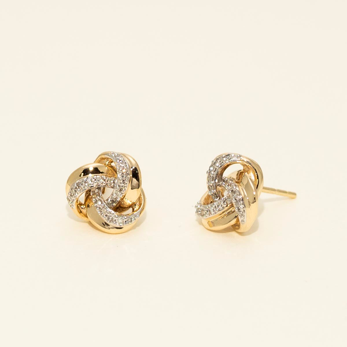 Diamond Love Knot Earrings in 10kt Yellow and White Gold (1/7ct tw)