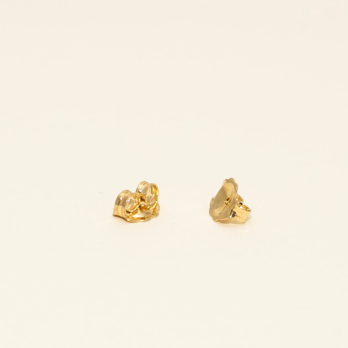 Diamond Love Knot Earrings in 10kt Yellow and White Gold (1/7ct tw)