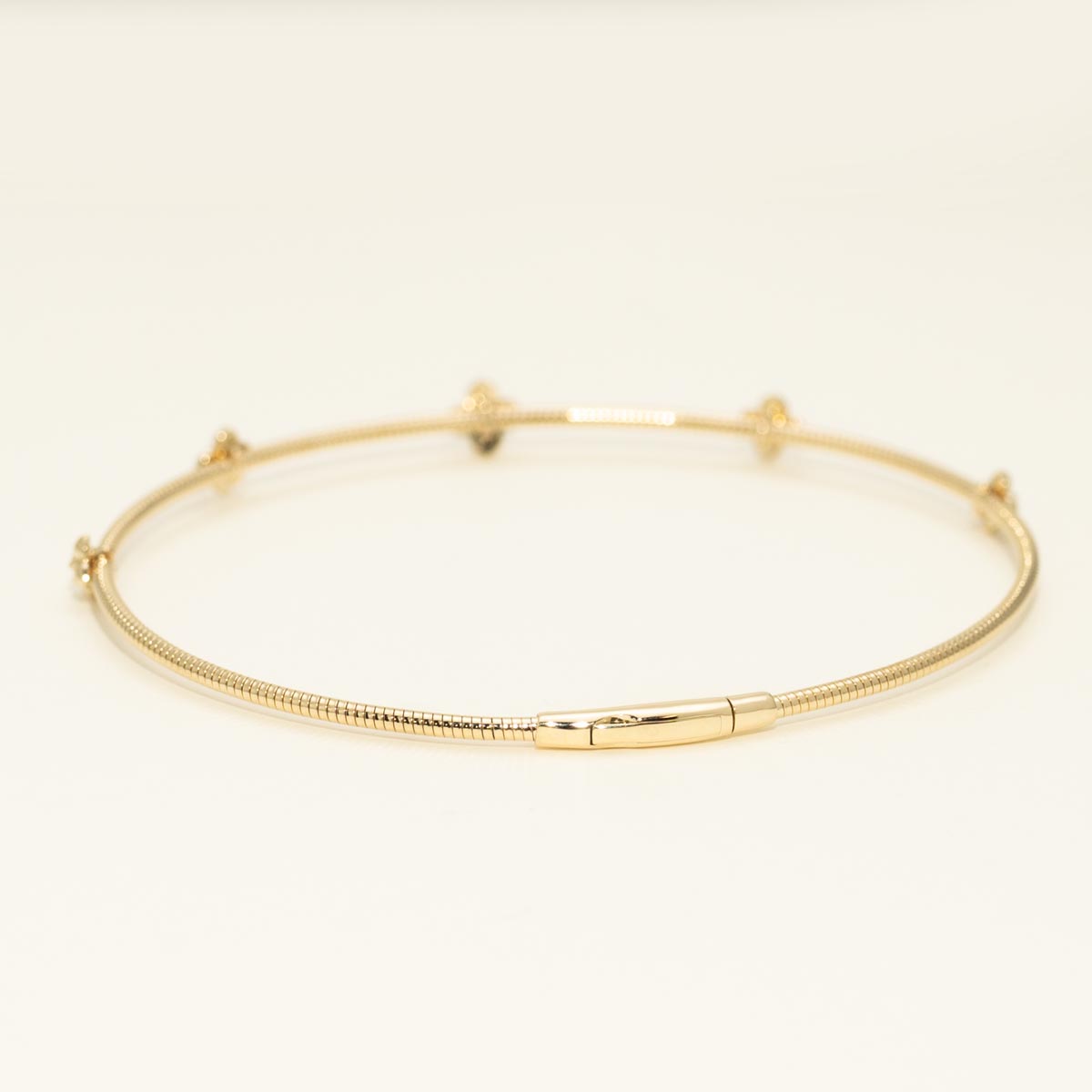 Diamond Flexible Bangle Bracelet in 14kt Yellow Gold (1/20ct tw)