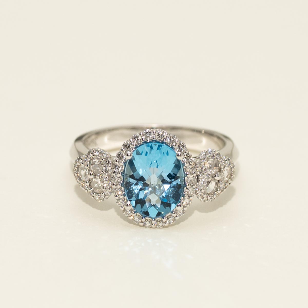 Oval Blue Topaz Ring in 18kt White Gold with Diamonds (1/2ct tw)