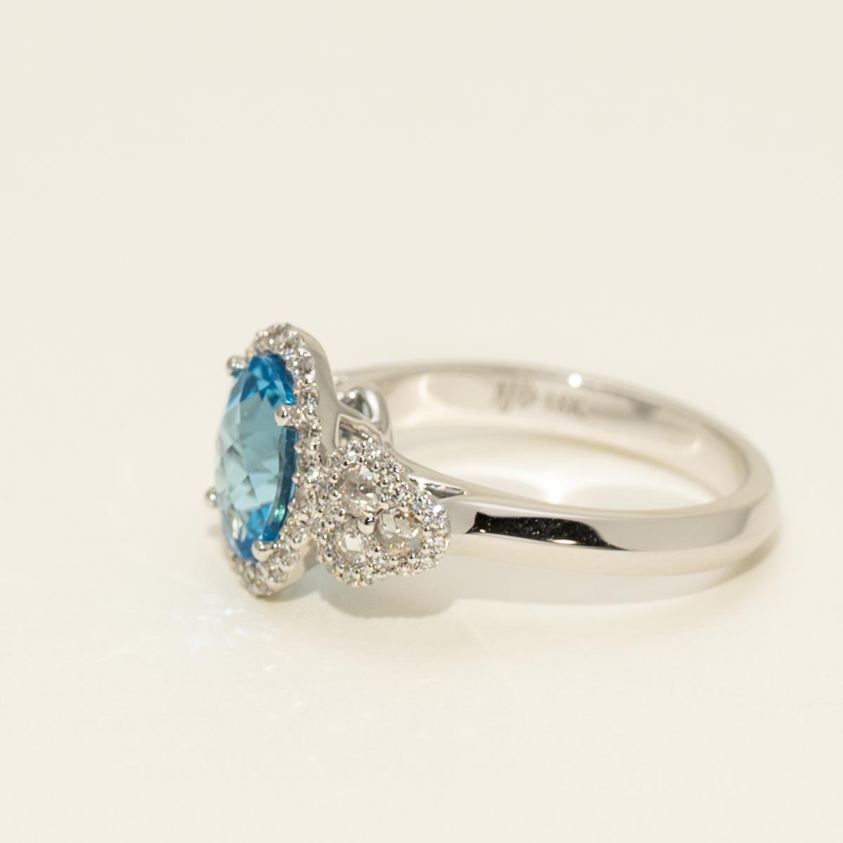 Oval Blue Topaz Ring in 18kt White Gold with Diamonds (1/2ct tw)