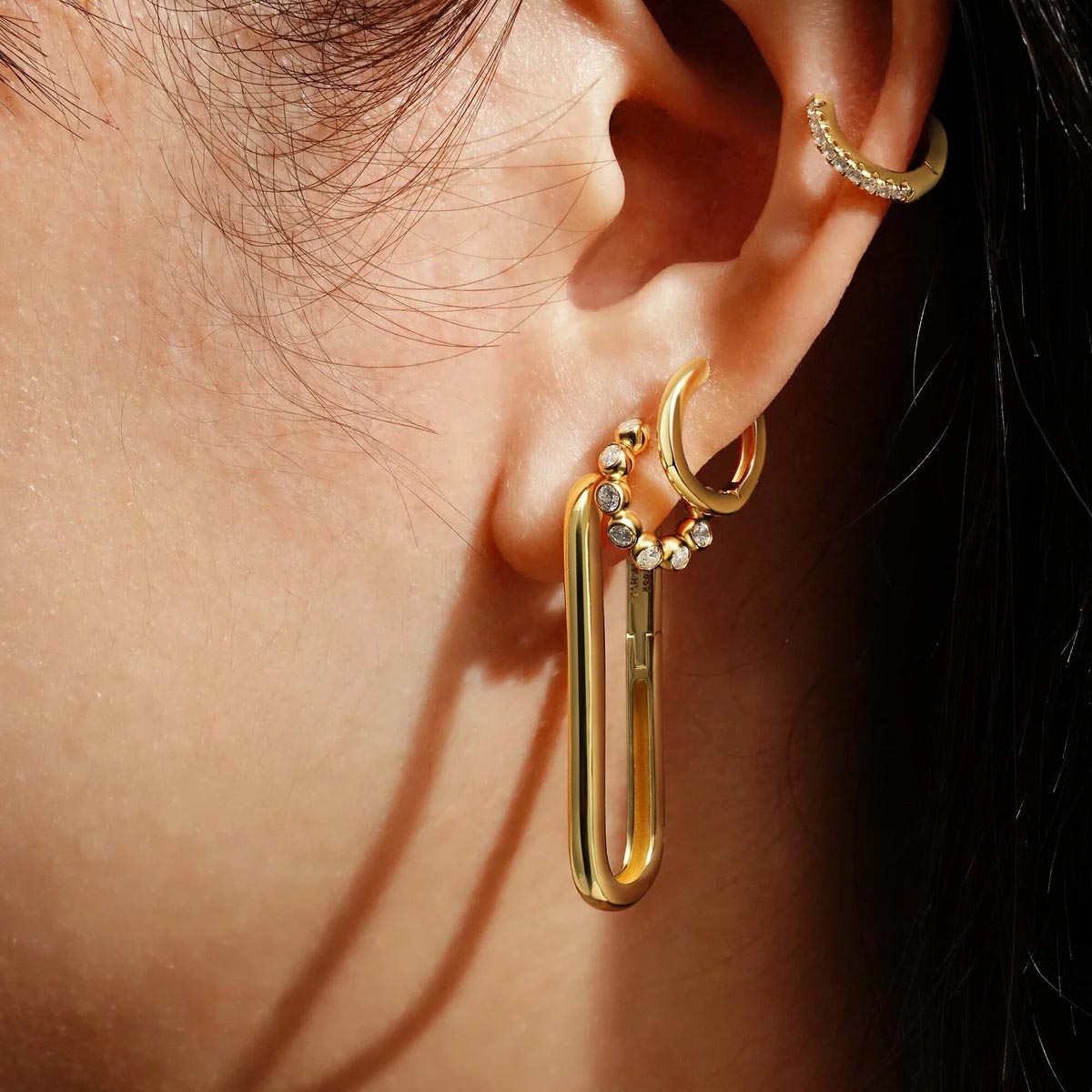 Ania Haie Cubic Zirconia Bezel Huggie Hoops in Sterling Silver with 14kt Yellow Gold Plate